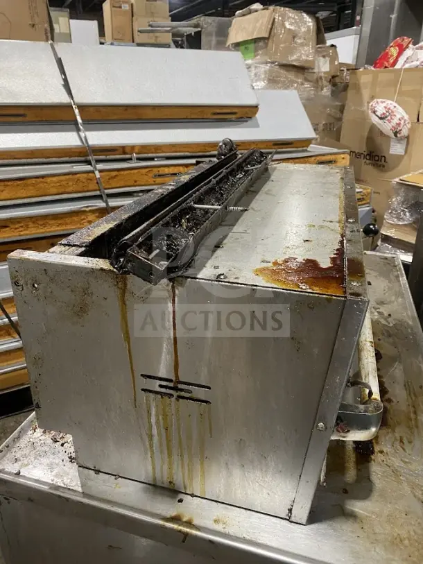 American Range Commercial Stainless Steel Salamander Broiler, used, visible grease and wear, ideal for commercial kitchens.