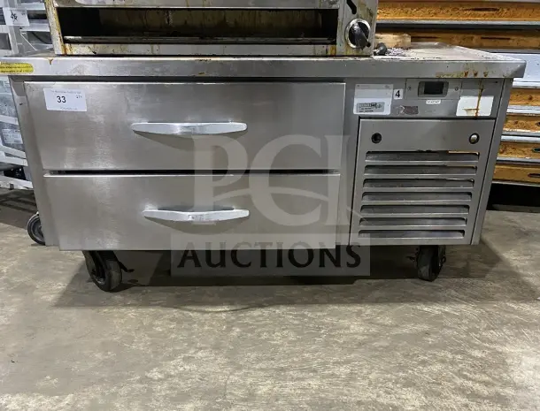 Commercial stainless steel 2-drawer refrigerated chef base on casters, heavy-duty, with control panel, in used condition.