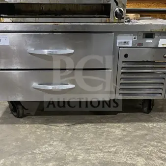 Commercial stainless steel 2-drawer refrigerated chef base on casters, heavy-duty, with control panel, in used condition.