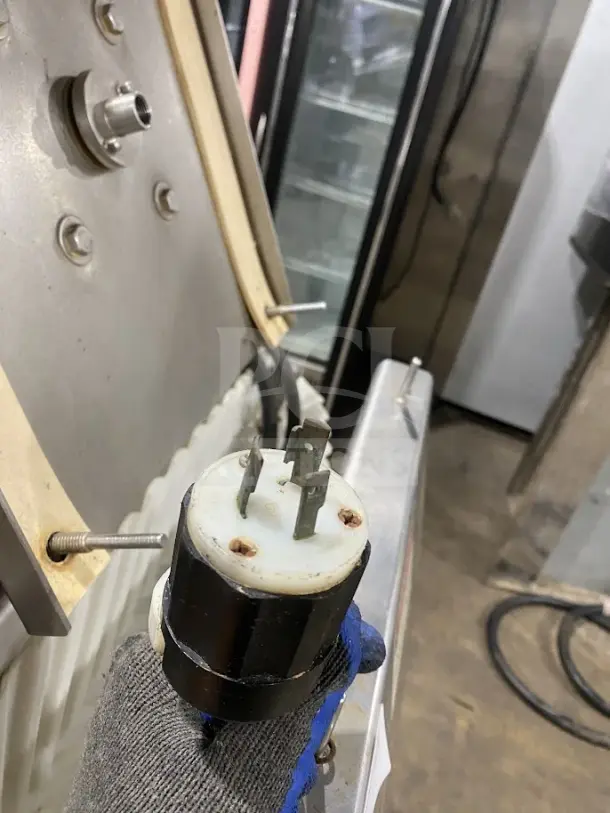Goodnature commercial stainless steel cold press juicer with hydraulic system, on casters. Visible plug and components.