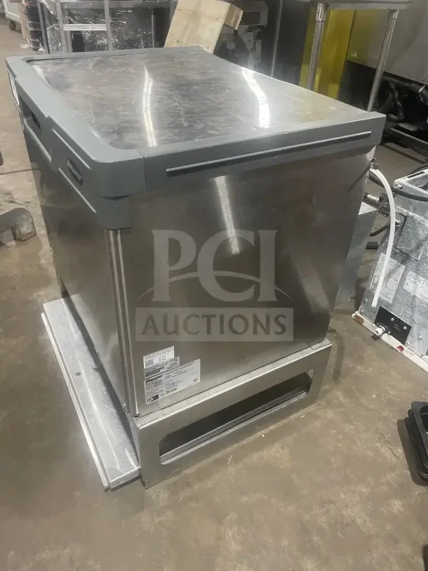 Follett stainless steel under-counter ice storage bin, good condition, visible product label with specifications.