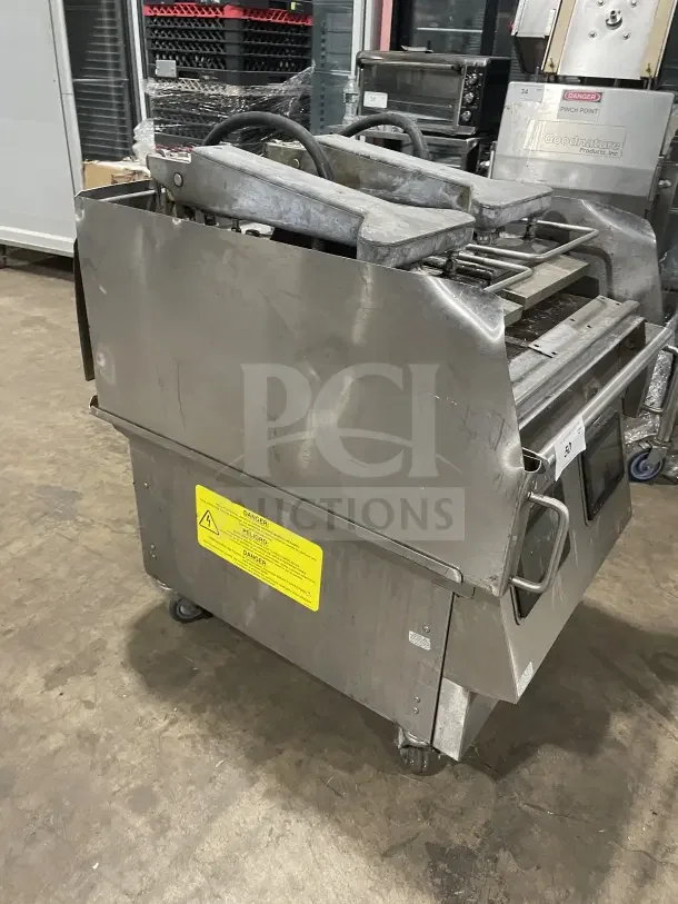 Garland XPG24 stainless steel gas clamshell griddle with dual platens, back and side splashes, on casters, model XPG24.