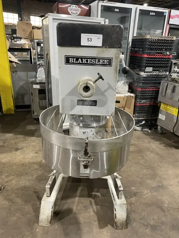 Blakeslee DD 80 commercial mixer with stainless steel bowl guard, on legs. Features 208V 3-phase power. Model SN: 3772015-EED.