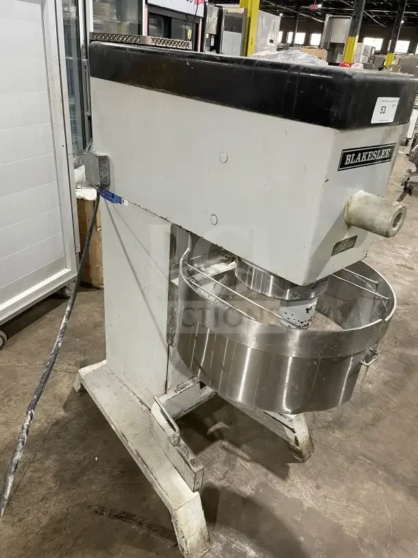 Blakeslee DD 80 commercial mixer, electric, heavy-duty, with stainless steel bowl guard, on legs, 208V 3-phase, model visible.