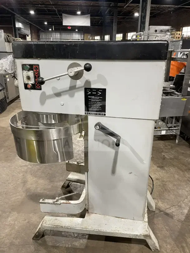 Blakeslee DD 80 commercial white electric powered planetary mixer. Includes stainless steel bowl guard and legs. 208V, 3-phase.