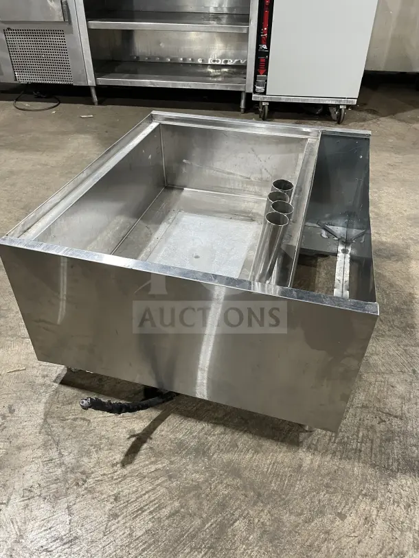 Krowne Commercial Stainless Steel Cold Plate/Ice Bin with legs, featuring durable construction and integrated compartments.