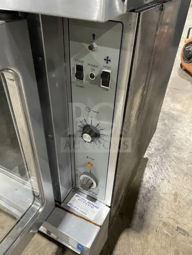Sunfire stainless steel gas convection oven, single stack, with oven wire rack; controls and repair label visible.