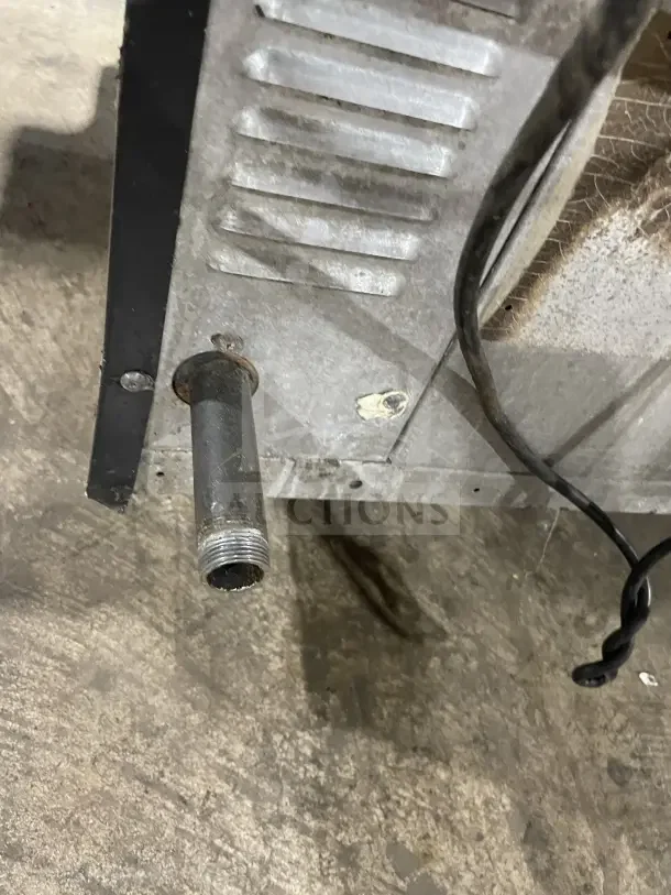 Sunfire stainless steel gas convection oven exhaust and wiring detail. Used commercial unit with visible wear. Includes oven rack.