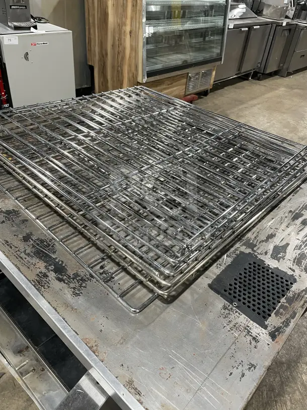 Sunfire stainless steel convection oven wire rack. Suitable for commercial use. Good condition, durable construction.