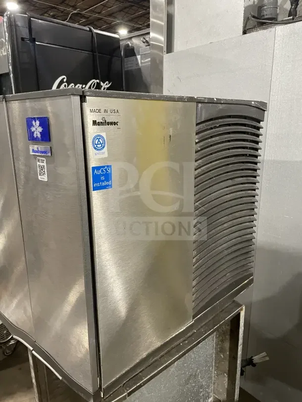 Manitowo SD0452A stainless steel ice maker, electric powered, lift open access, on legs. Made in USA, AuCS system installed.