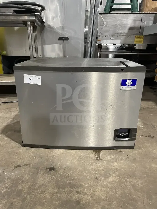 Manitowoc Stainless Steel Ice Machine Head, Model IY0606A261, SN 1120402941. Good condition, control panel visible.