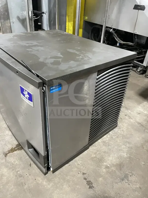 Manitowoc stainless steel ice machine head, Model IY0606A261, used condition, AHA certified tag visible.