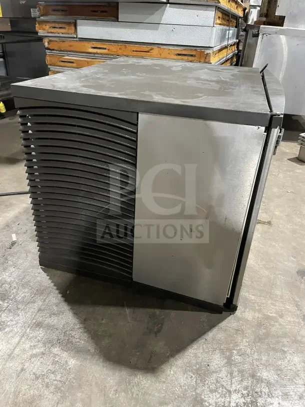 Manitowoc stainless steel ice machine head, Model IY0606A261, used condition, visible surface wear, serial 1120402941.