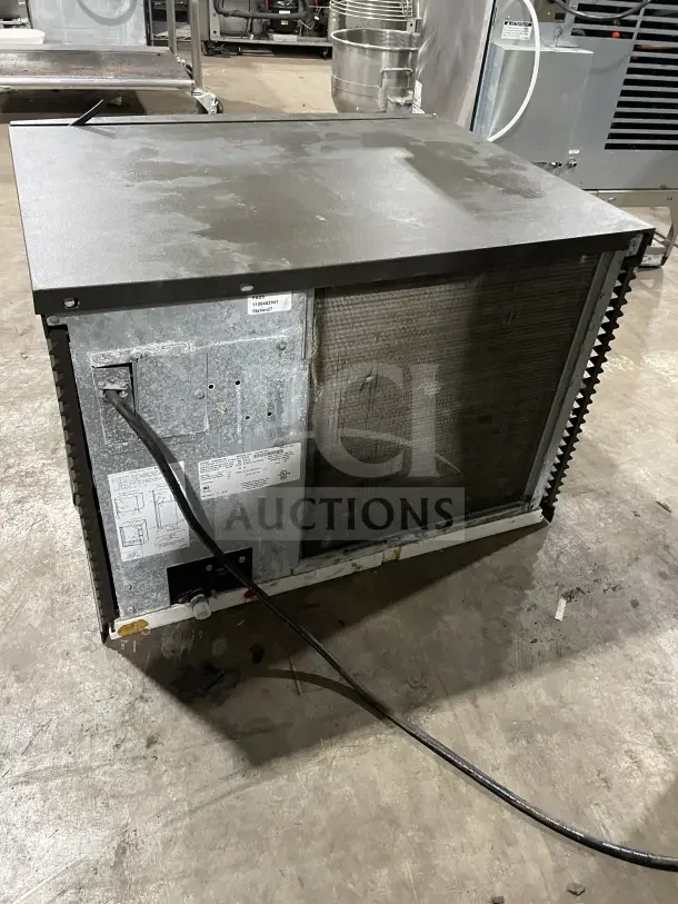 Manitowoc IY0606A261 stainless steel ice machine head, model IY0606A261, SN: 1120402941, commercial-grade, used condition.
