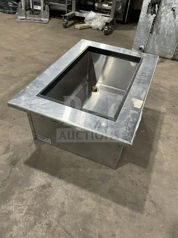 SupremeMetal stainless steel bartender and sink system, Model DICP-1, in good condition with visible label.