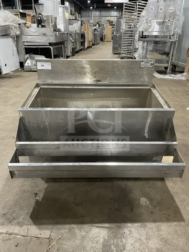 Krowne KR21 36 8 stainless steel underbar ice bin with cold plate, 36" wide. Good condition. Serial No. 03030006008.