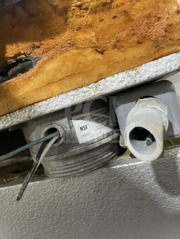 Tafco commercial walk-in prep cooler/freezer detail showing NSF label and electrical components, highlighting industrial use.