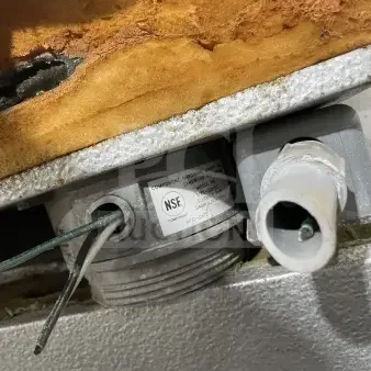 Tafco commercial walk-in prep cooler/freezer detail showing NSF label and electrical components, highlighting industrial use.