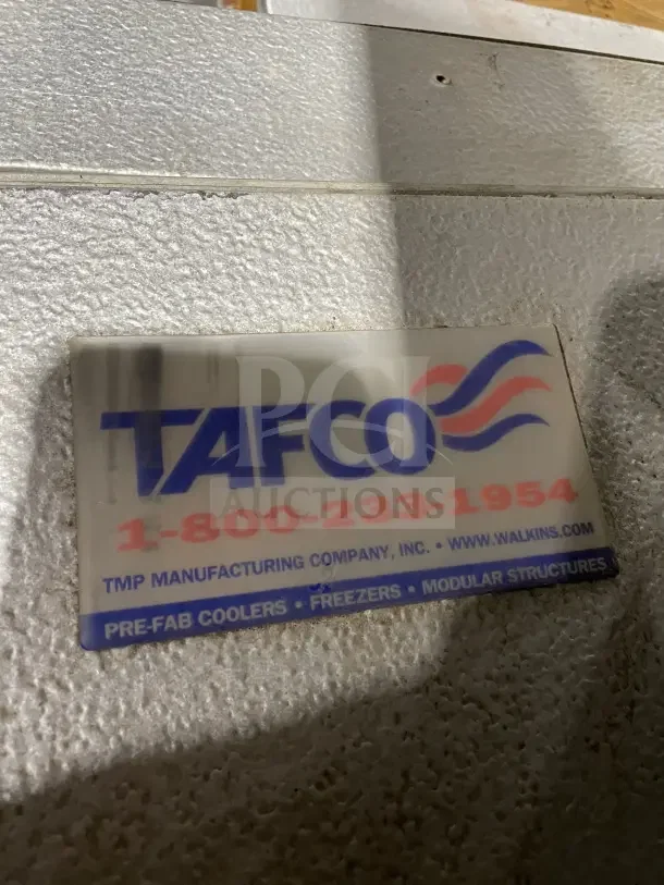 Tafco Commercial Walk-In Prep Cooler/Freezer, textured metallic surface, TMP Manufacturing tag with contact info.