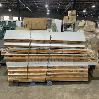 Tafco Commercial Walk-In Prep Cooler/Freezer parts stacked on pallets, good condition, features insulation panels.