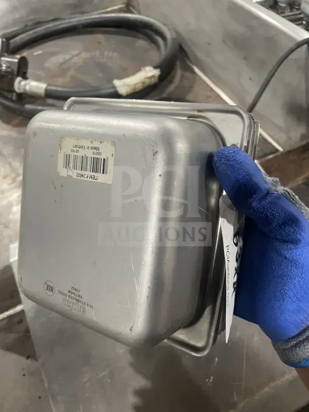 Amko stainless steel half-size steam table pan, model 24602, used condition with visible scratches, NSF certified marking.