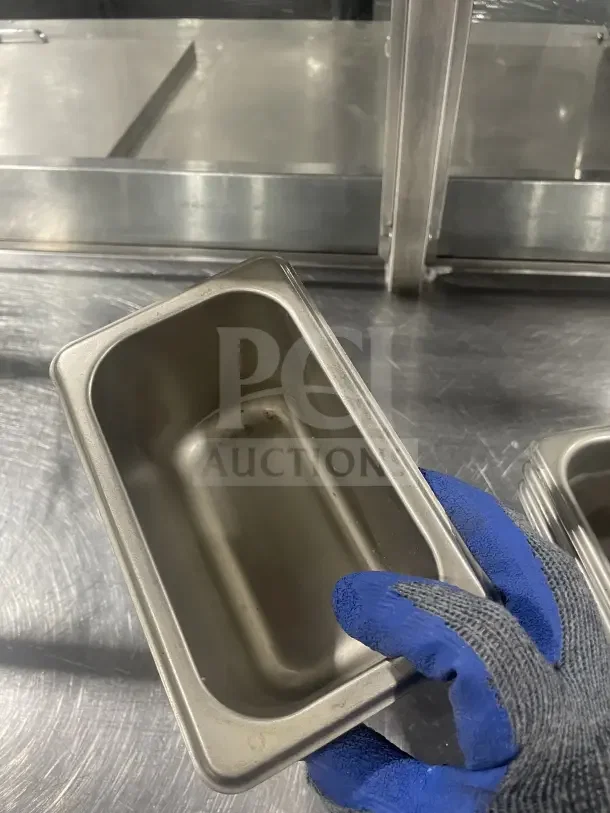 Winco SPN4 stainless steel half-size steam table pan, commercial grade, lightly used, durable and multi-purpose.