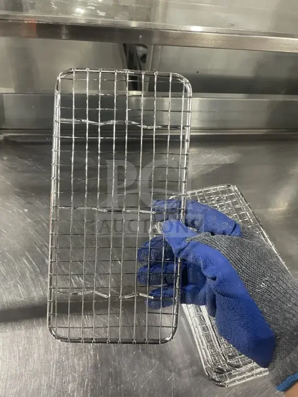 Vollrath stainless steel pan grate, 1/3 size, wire grid design, excellent condition, ideal for commercial use.