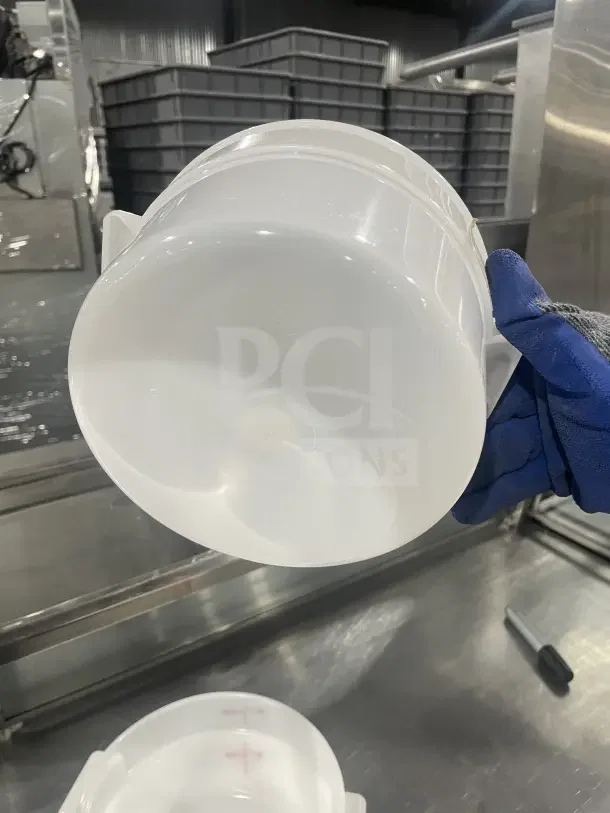Cambro RFS2148 white round polypropylene food container, shown in a commercial kitchen, in excellent condition.