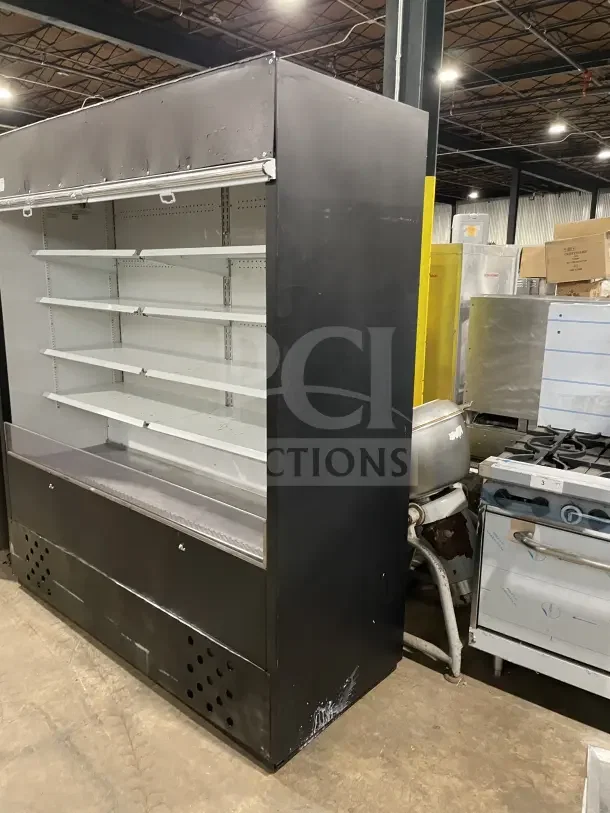 Commercial open-air merchandiser refrigerator with multi-deck display, black exterior, shelving, used condition.