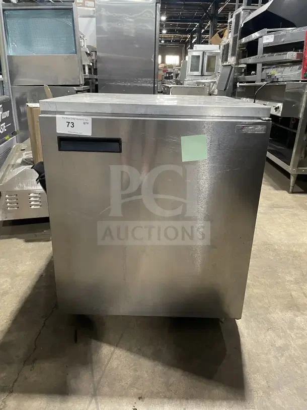 Delfield Enodis Series 406CA DD1 stainless steel single door undercounter refrigerator, on casters, with poly-coated rack.