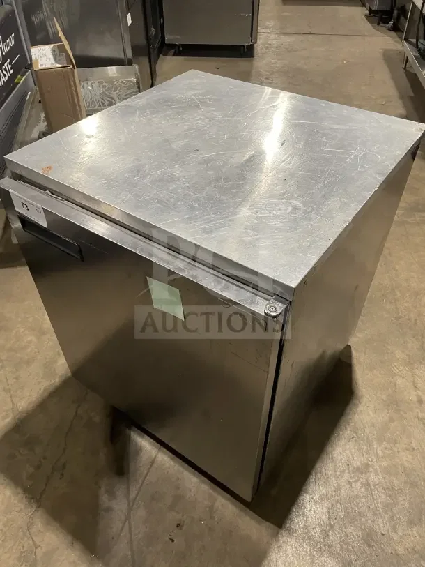 Delfield Enodis Series 27" stainless steel undercounter refrigerator, model 406CA DD1, with poly-coated rack, on casters.
