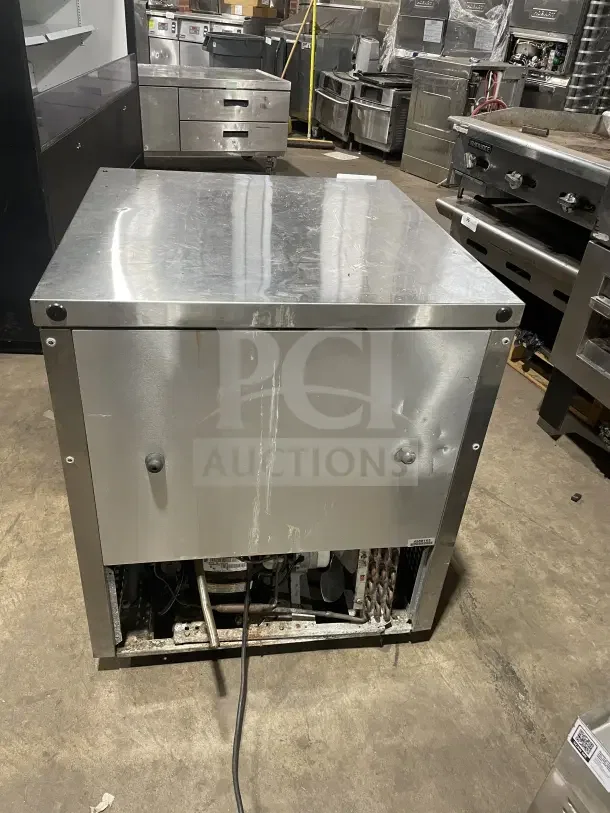 True TUC27LP commercial stainless steel lowboy cooler, single door, worktop, 115V, visible wear, serial #5033018.