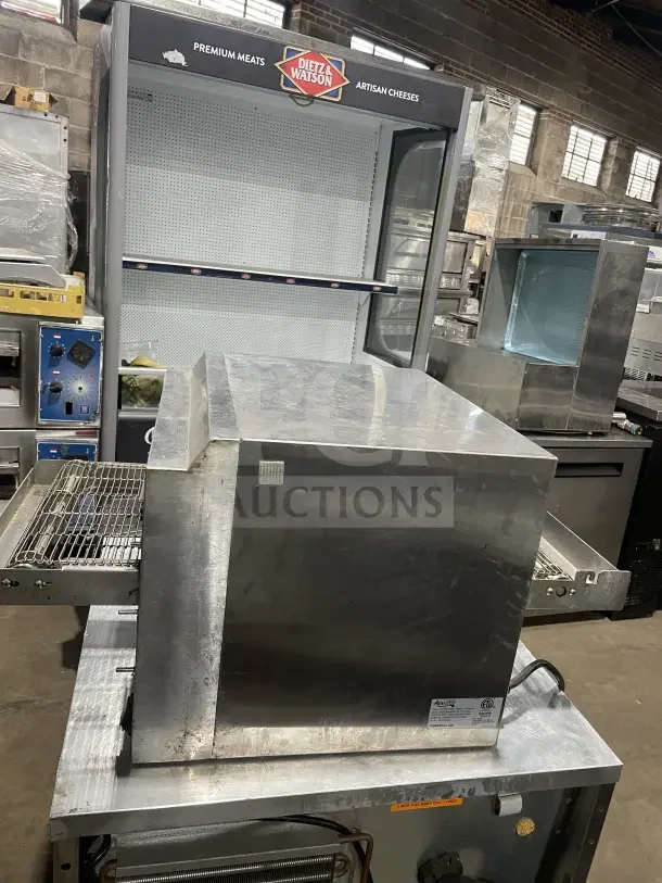 Avantco TTP14240 Commercial Stainless Steel Conveyor Pizza Oven, countertop model, shows moderate wear, visible control panel.