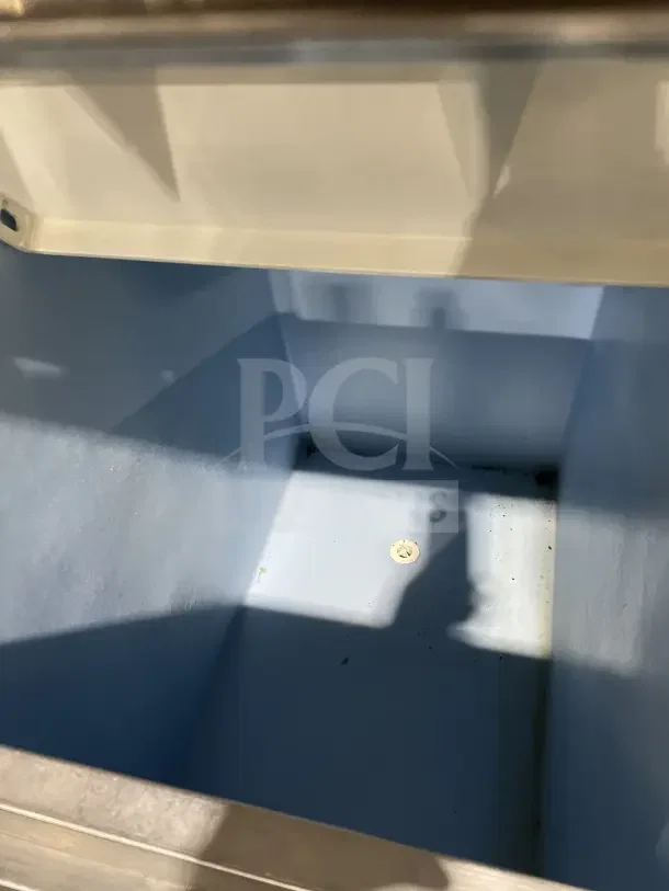 Hoshizaki commercial stainless steel ice machine with storage bin on legs, slim-line design, shown empty inside, excellent condition.