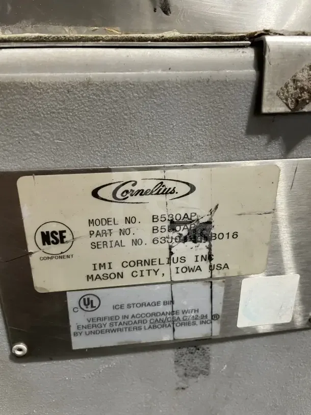 Hoshizaki commercial stainless steel air-cooled ice machine with storage bin, featuring NSF and UL labels.