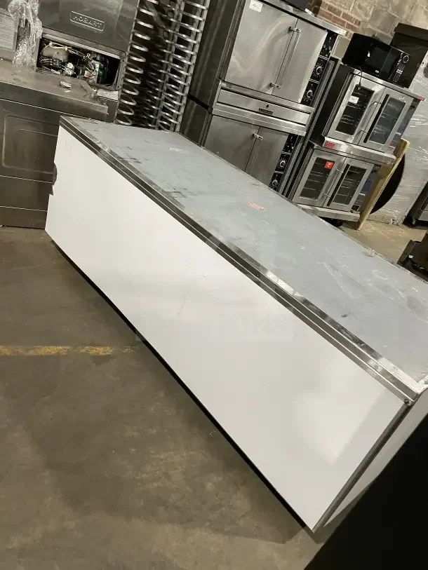 Commercial stainless steel 3-glass door bench fridge with casters, Model RF CSY0702, in good condition.