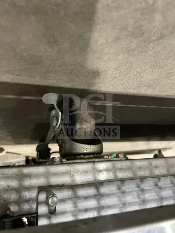 Commercial stainless steel bench fridge caster from model RF CSY0702, showcasing sturdy wheel for easy mobility.