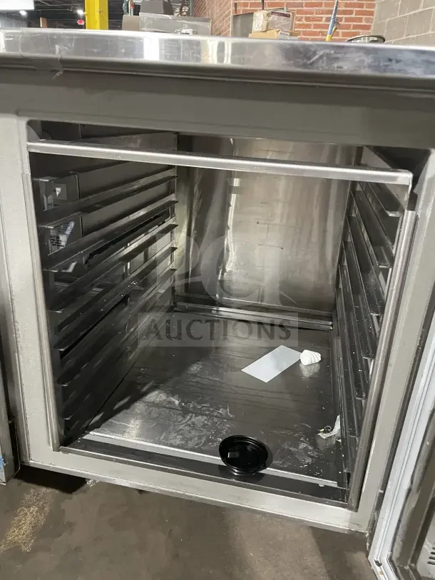 Commercial stainless steel 3 glass door gastronorm bench fridge, model RF CSY0702, on casters, open interior view.