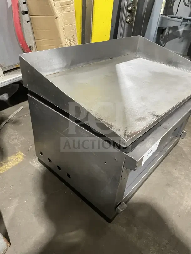 Cecilware stainless steel countertop gas griddle and cheese melter. Features durable construction, used condition.
