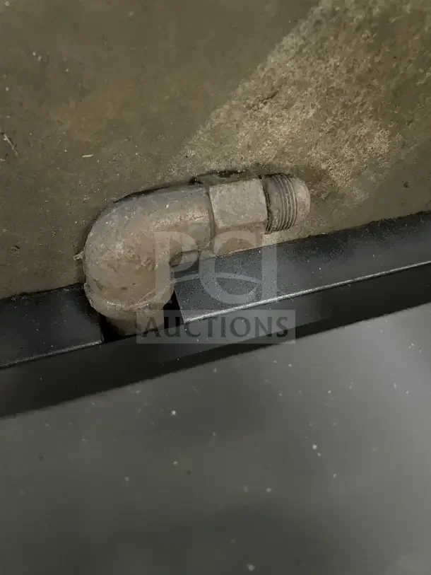 Cecilware stainless steel gas griddle and cheese melter with visible metal pipe connection, showcasing industrial design.