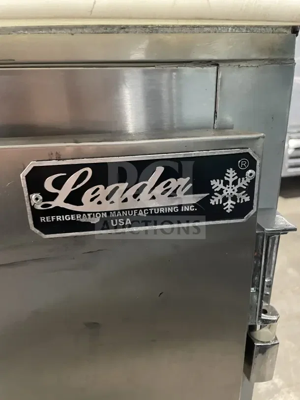 Leader LM72 stainless steel 3-door refrigerated prep table with label. Model LM72, SN: PQ012493, on casters.