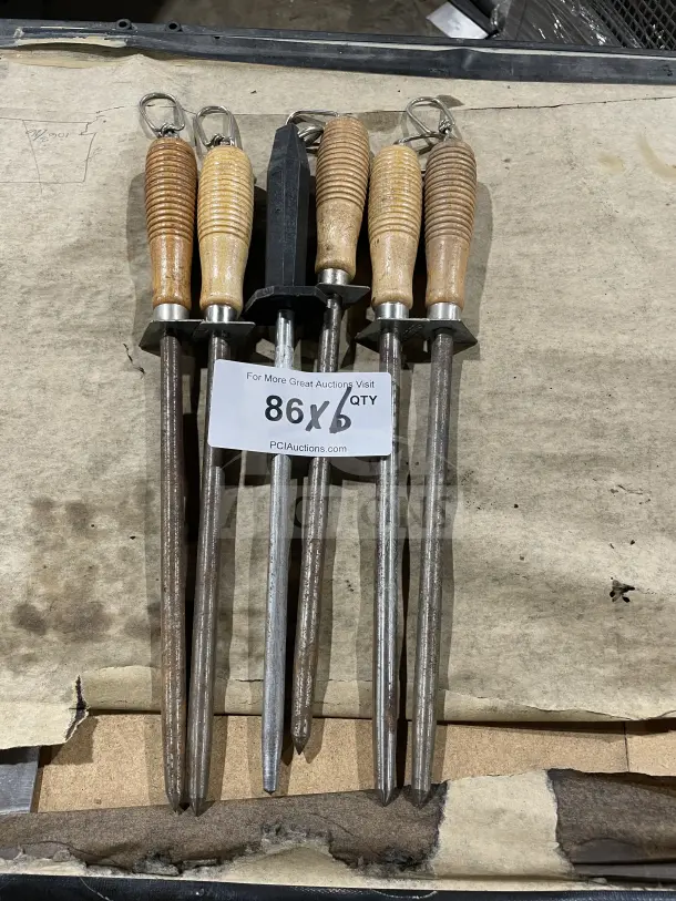 Commercial bulk lot of six kitchen knife honing steels with ribbed wood and composite handles. Mixed condition.