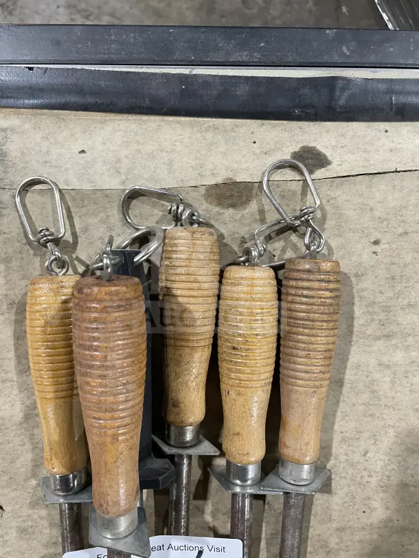 Commercial bulk lot of six ribbed wood and composite handle kitchen knife honing steels, gently used, with metal hooks.