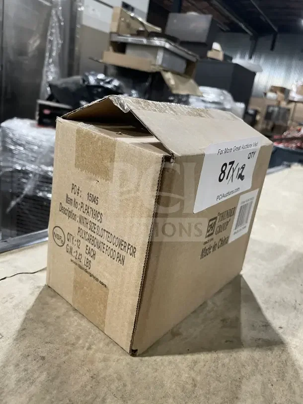 Cardboard box containing Thunder Group clear polycarbonate notched food pan cover. Box labeled NSF certified, 12 count, Made in China.