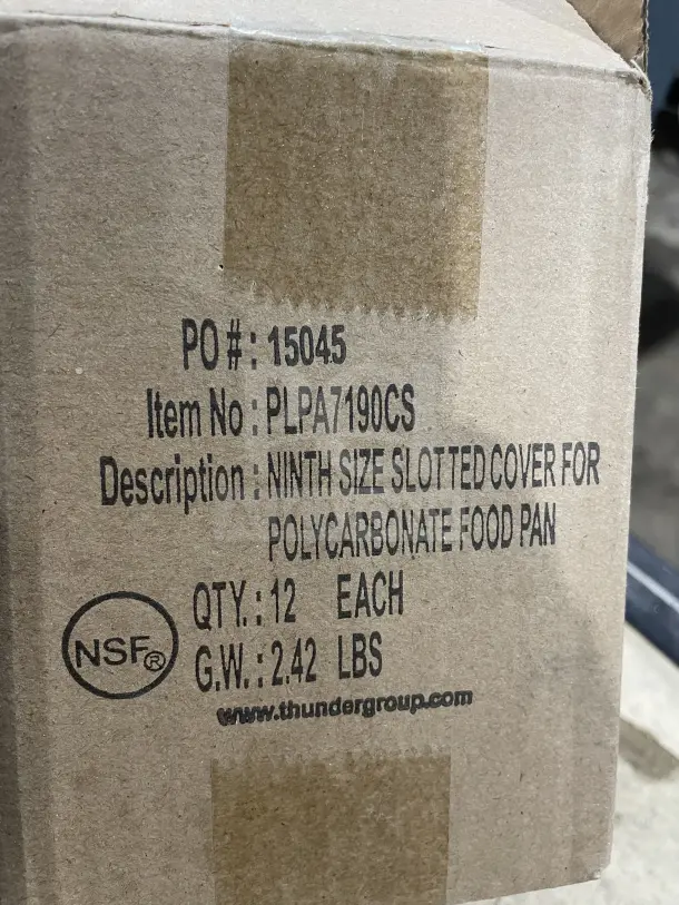 Box labeled "Thunder Group" containing 12 ninth-size slotted polycarbonate food pan covers. Model PLPA7190CS, NSF certified.