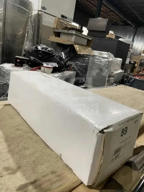White box containing T&S Commercial Lever Handle Waste Drain Valve, brand new condition, auction tag reading "89."