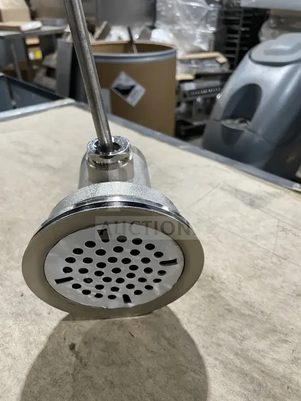 New T&S commercial lever handle waste drain valve, stainless steel, polished finish, unused condition.
