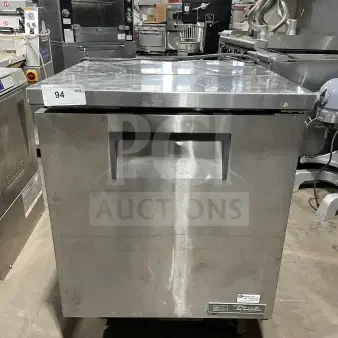 True commercial stainless steel salad/sandwich prep table, model TSSU-27-08-HC, on casters, with poly-coated wire rack.
