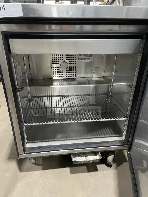 True commercial stainless steel single door refrigerated prep table, Model TSSU-27-08-HC, poly coated wire rack, on casters.