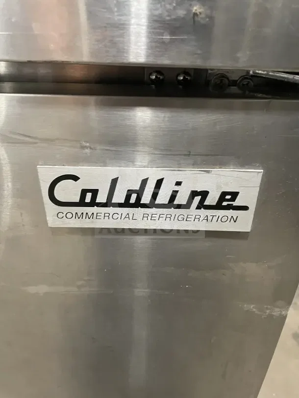 Coldline UUC27RHC 27" stainless steel undercounter refrigerator. Features poly-coated wire rack and commercial-grade design.
